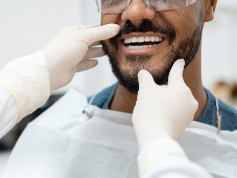 dentist examining teeth